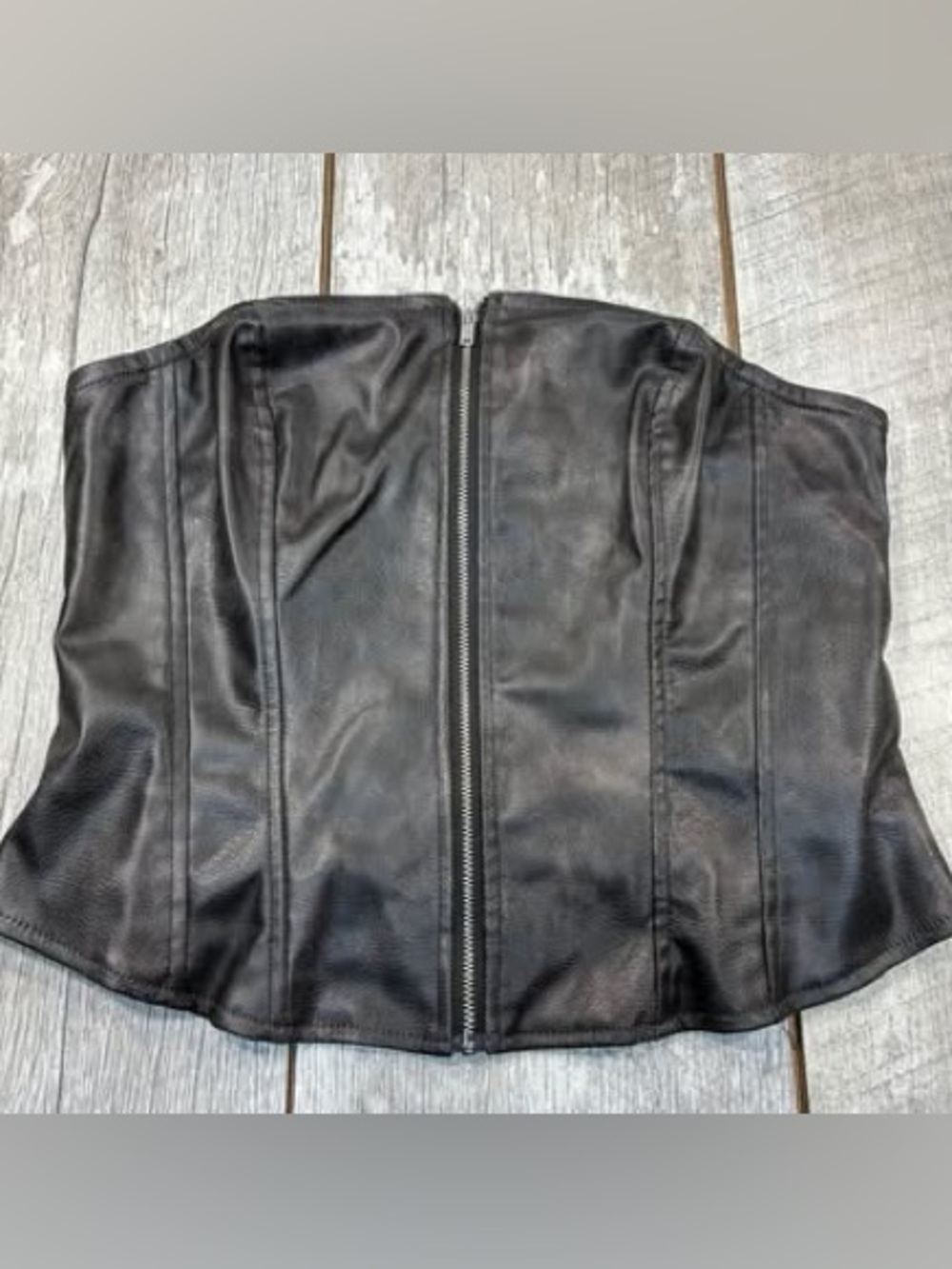 Divided women’s fake leather corset size medium
Full front zipper light black